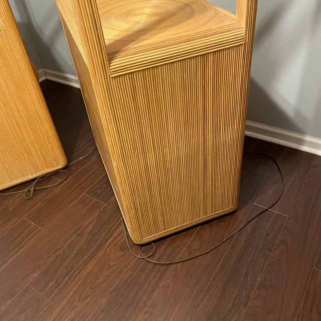 Pair of fantastic natural toned Gabriella Crespi inspired etageres with glass shelves and additional shelving behind...