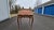 writing desk/Table with curved sides and carved legs. New reproduction. Cherubs holding candelabra on the front corners....