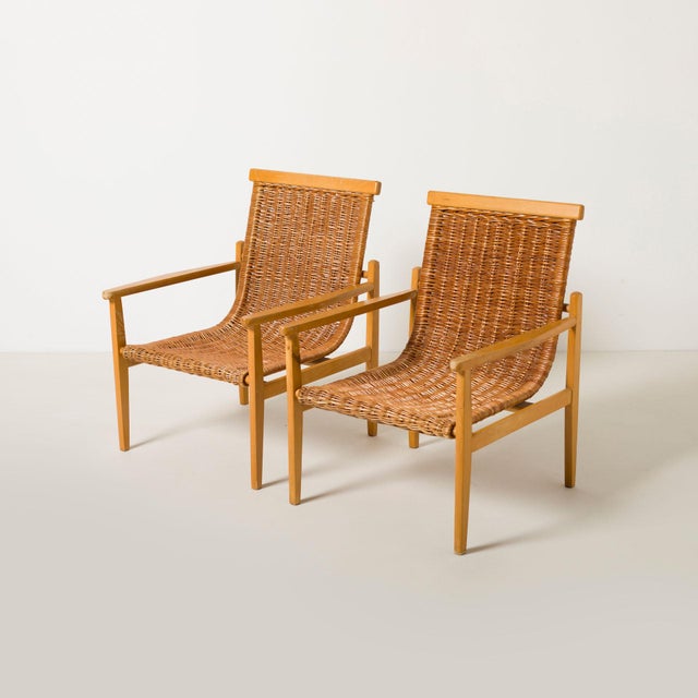 Pair of wood and wicker lounge chairs from ULUV, Czechoslovakia, 1960s Good, original condition. Some patina on the beech...
