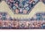 A wonderful early 20th century Persian Malayer rug with a central floral medallion living on a solid tan field, surrounded...