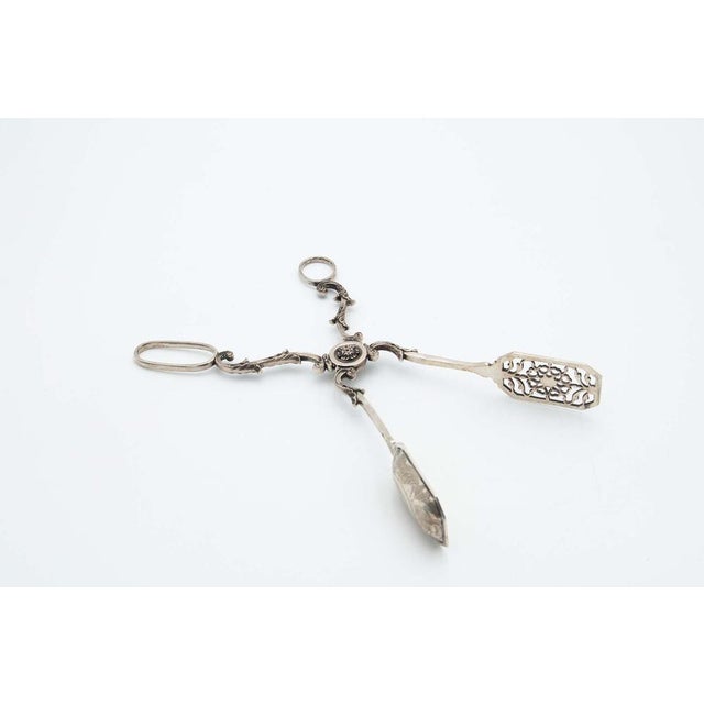 Silver Tongs for Bread with Cutouts, in Good conditions.