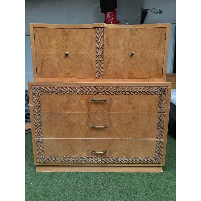 I Have a Stunning and Very Rare Hand Carved 1950's Bird's Eye Maple Tall Dresser. This tall dresser is in very good...