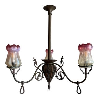 Antique Chandelier With Ornate Metal-Work and Pink Fluted Tulip Shades For Sale
