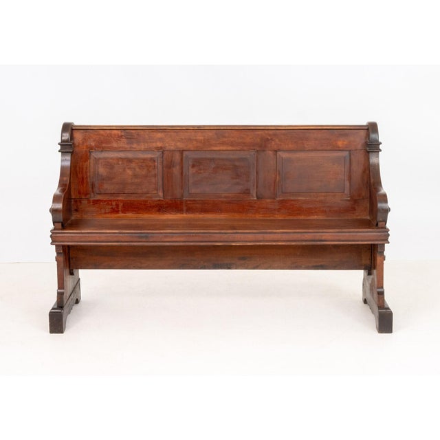 American Renaissance Style Wood Church Pew, with carved arch motif pew ends, the reverse with book rack. 36" H x 59" W x...