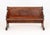 American Renaissance Style Wood Church Pew, with carved arch motif pew ends, the reverse with book rack. 36" H x 59" W x...