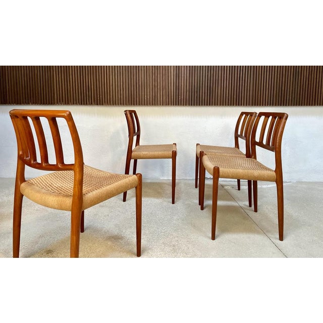 This high-quality set of four dining chairs was manufactured in Denmark during the 1970s by J.L.Møllers Furniture Factory....