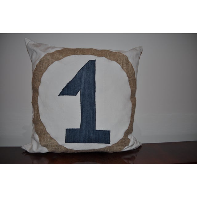 This youthful, modern and fashionable pillow, with the stylish No.1 label, can be an unique decoration element of the...