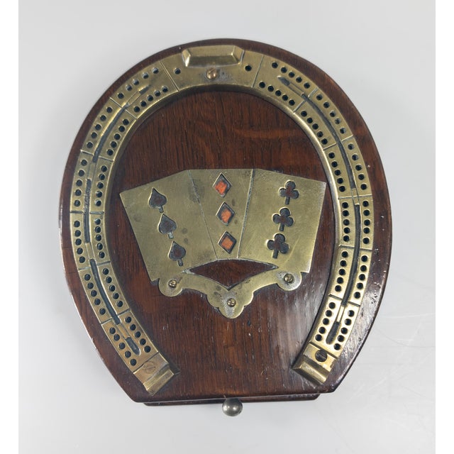 We are selling this cool decorative English brass and oak gaming set. This piece has main decoration of playing cards with...