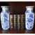 An impressive pair of large vintage Chinese export porcelain vases. These stately pieces feature a traditional hexagonal...