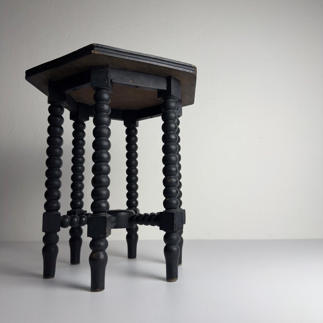 Pair of Beautiful antique Italian solid walnut side tables, features a hexagonal top with beveled edges over four...