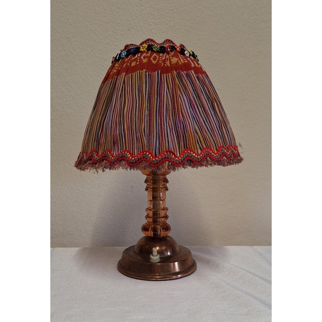 Art Deco German Table Lamp with Copper Base and Pink Tinted Glass Segments by Lamplove, 1930s, in Very Good conditions....