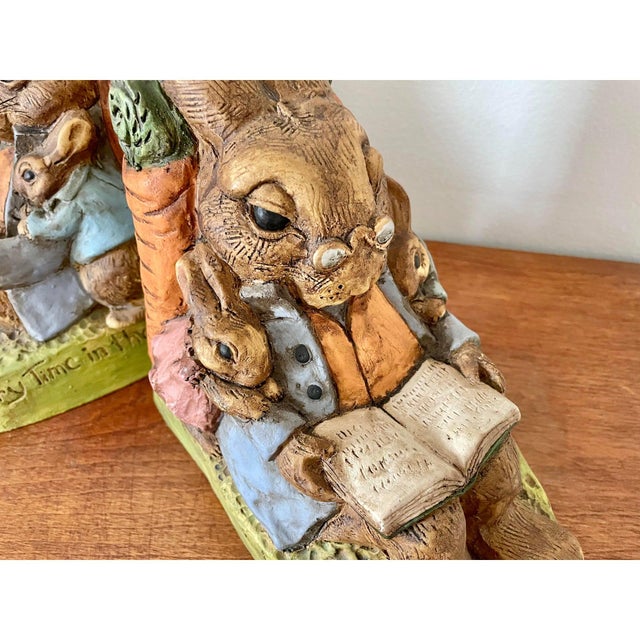 Pair of hand painted cast resin rabbit bookends designed by Telle M. Stein. They are signed and dated 2004 in the cast....