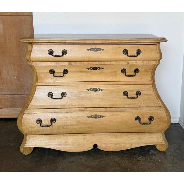 A wonderfully sculptural and highly coveted Dutch bombe chest of drawers, in the 18th-century Baroque manner, finished in...