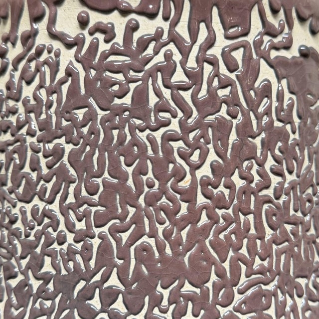 This 1960s mizusashi combines a calm, classic silhouette with a beautifully animated surface. It comes with a lid topped...