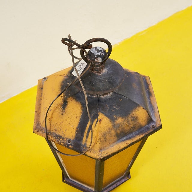Antique lantern in iron and amber glass height: 63.5 width: 45 depth: 38 additional information style: antique production...