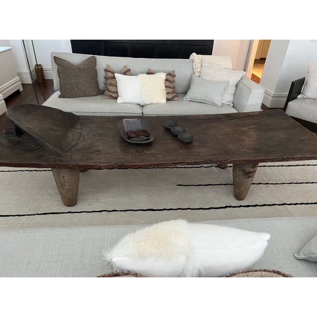 This African Senufo bed comes from the Ivory Coast and can be used as a coffee table or bench c. It is carved from a...