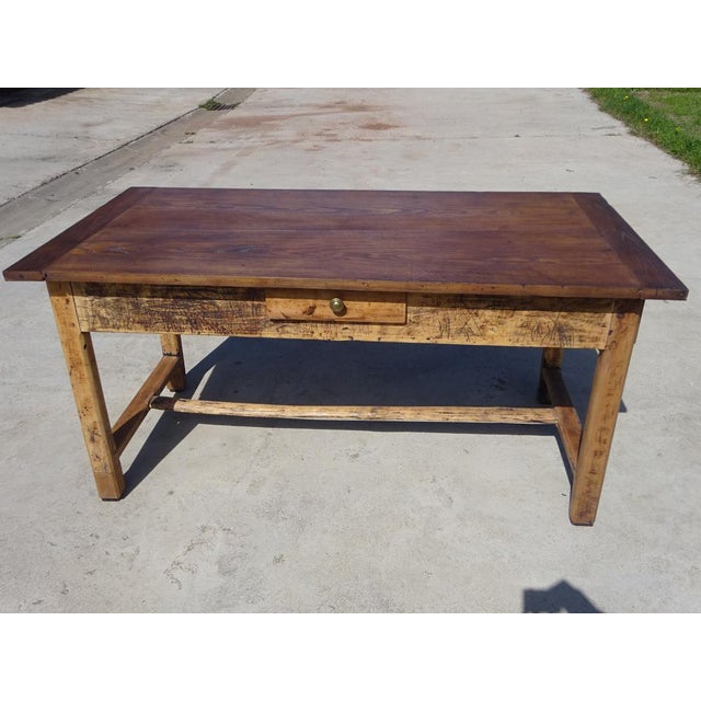 A very old 19th-century farmhouse table, entirely made of solid oak and fully restored. beautiful oak top, composed of two...