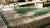 Magnificent Green Open Field With Intricate Floral Medallion Antique Indian Amritsar Rug For Sale - Image 12 of 13
