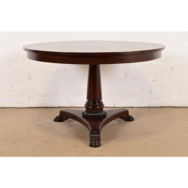 An exceptional Neoclassical or Empire style round pedestal dining breakfast table, game table, or center table By Kindel...