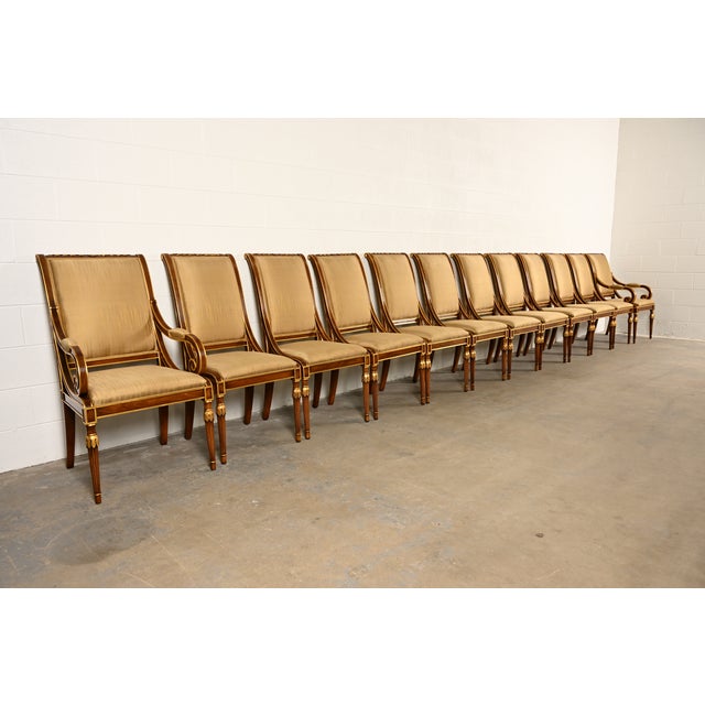 An outstanding set of twelve French Regency Louis XVI or Neoclassical style dining chairs By Karges Furniture USA, Circa...