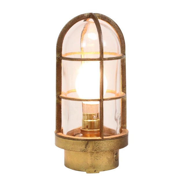 Old industrial cage lamp, ship's lamp made of glass and brass, marked IR on the glass and on the housing, which stands for...