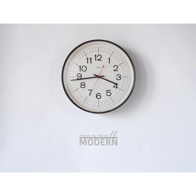 A very rare vintage find from Howard Miller! This large metal wall clock was made for schools and warehouses in the 1950s...