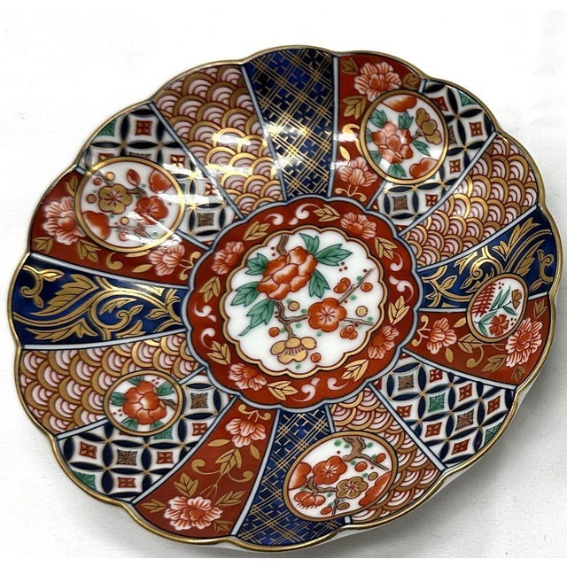 Vintage Arashiyama Jin Japanese Imari Porcelain Plates - Pair Elevate your collection with this exquisite pair of Japanese...