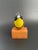 A hand crafted and hand painted small wood Oriole on stand. Nice condition with slight overall wood and paint wear. No...