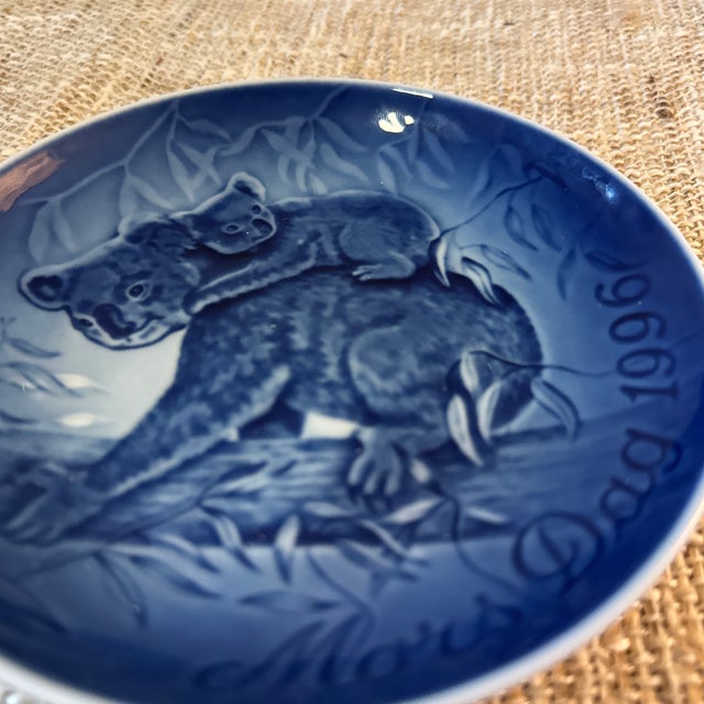 Add a touch of Scandinavian charm to your collection with this beautifully crafted Koala decorative plate by Royal...