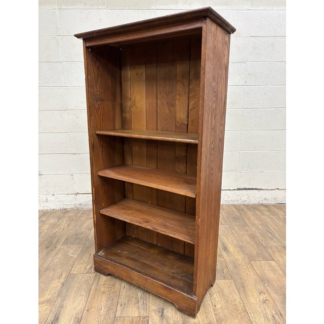 This is a gorgeous antique rustic bookcase, bookshelf, or etagere by Larkin Co of Buffalo NY. It features three adjustable...