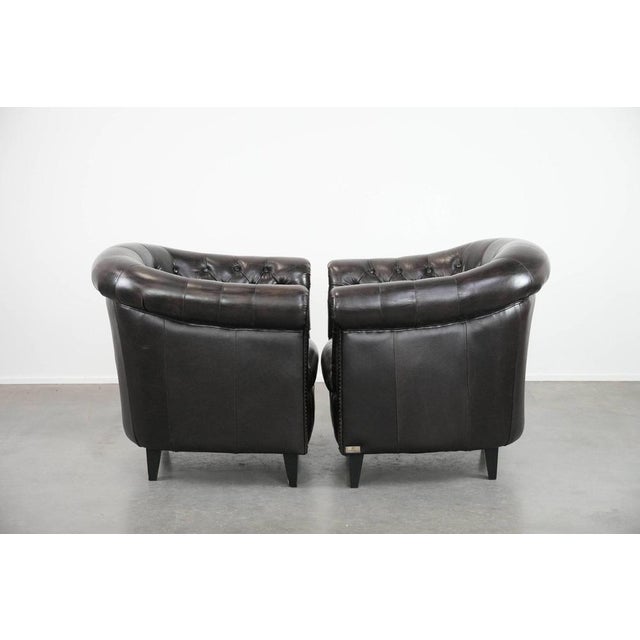 Vintage Chesterfield Club Chairs in Dark Cowhide Leather, Set of 2, in None conditions. Designed 1980 to 1989