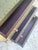 Pair of Vintage Hollywood Regency Brass-Clad Riveted Nightstands With Glass Tops For Sale - Image 11 of 12