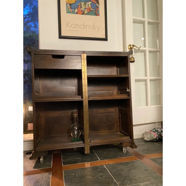 Time warp back to the 1960's with this stylish Vintage Ethan Allen Folding Wood Bar with 2 sections, containing 5 shelves...