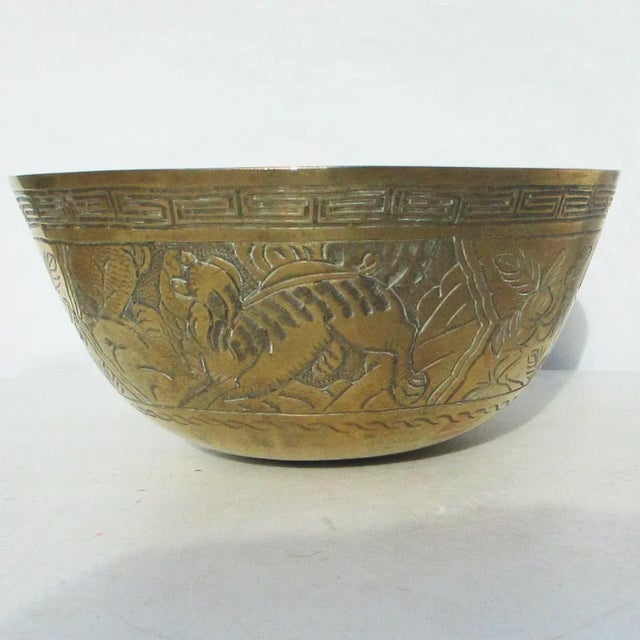 Chinese early 20th-century water gong bowl for temple or personal practice. Seated on a small pillow the rounded bottom is...