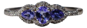 The Stomar: Three Stone Tanzanite and Diamond Ring in White Gold