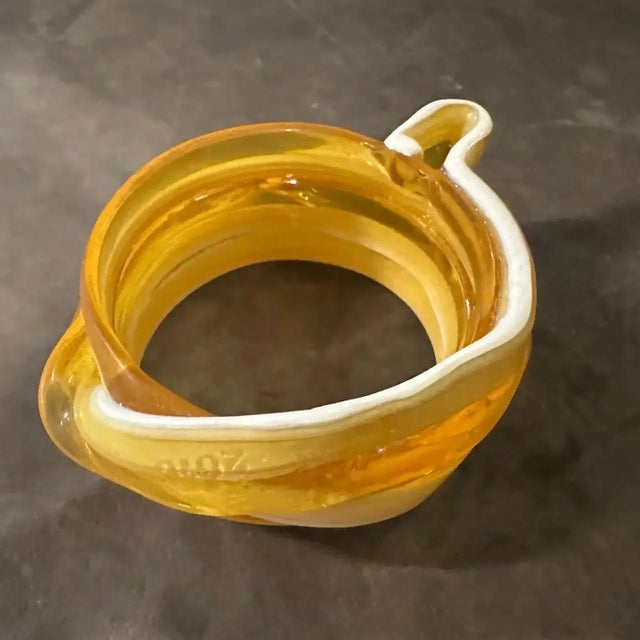 This vintage 21st-century rubber bangle bracelet is a distinctive piece designed by Gaetano Pesce for Corsi Design from...