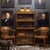 ABOUT An antique lawyer's bookcase with four modular, stacking glass-front tiers plus top crown molding and a footed base....