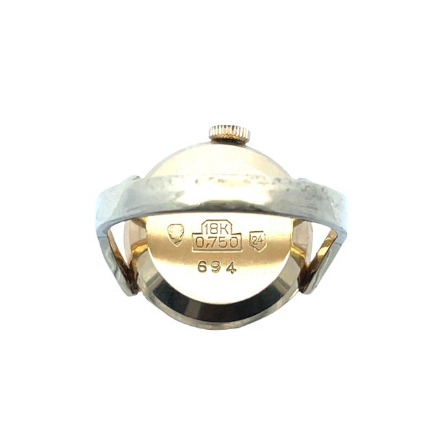 A rare and charming vintage Gigandet watch ring crafted in solid 18K yellow gold, featuring a petite Swiss-made dial with...