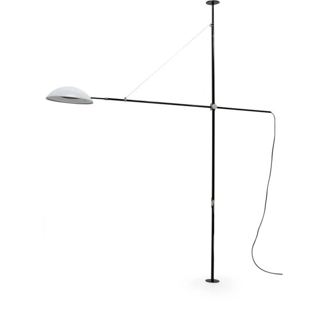 Halogen tube with dimmer; Ceiling height must be between 220 cm – 260 cm. This piece has an attribution mark, I am sure...