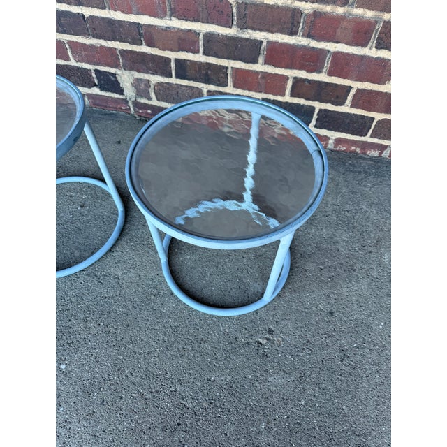 Pair of round Brown Jordan side tables great pair