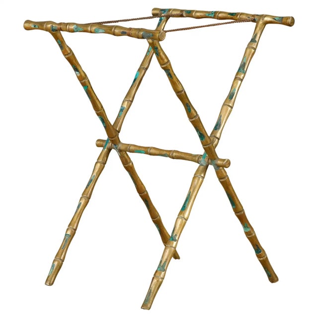 This mid-century Mexican Modern folding side table is an expressive and sculptural example of the brass-and-enamel work by...