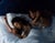 Entre Sueños by Ximena Rendon | Oil on aluminum panel Painting of a woman sleeping beside her reflection. For Sale