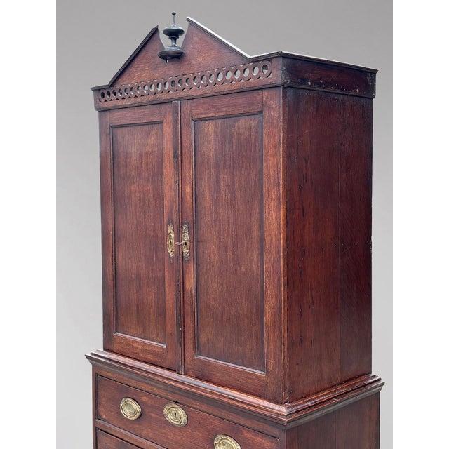 A Handsome Small 18th-Century Georgian Oak Housekeeper’s Cupboard A fine quality late 18th-century George III period...