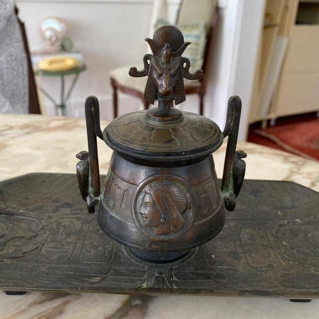 Gorgeous bronze inkwell from the 19th century in the style of Egyptian Revival. Heavy with beautiful ornate details....