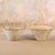 A stunning pair of hard-to-find models, these French cast stone round planters are attributed to Willy Guhl (1915–2004),...