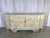Magnificent Italian Rococo style credenza, a sculptural statement piece with incredible presence. This rare painted...