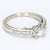 This is a 14k White Gold Engagement Ring with Diamond Accents. The primary stone is a 0.5 carat Brilliant-cut Diamond,...
