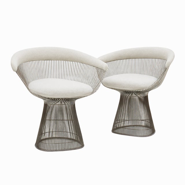 Set of 4 chairs designed by Warren Platner between 1968 and 1970, featuring a chrome-plated steel structure and white...