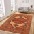 An exhilarating oriental rug with distinctive motifs and wide-ranging pallet of warm colors, this antique vintage...