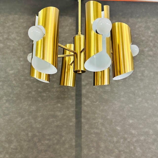 Dimensions: H 26” x W 17” Vintage German Space Age chandelier with cylindrical shades from the 1970s. Please see our other...